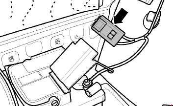 Emplacement des éléments de relais derrière le revêtement latéral du coffre Passat B6.