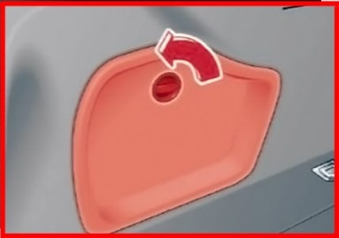 Emplacement de la boîte à fusibles derrière le revêtement gauche du compartiment arrière.