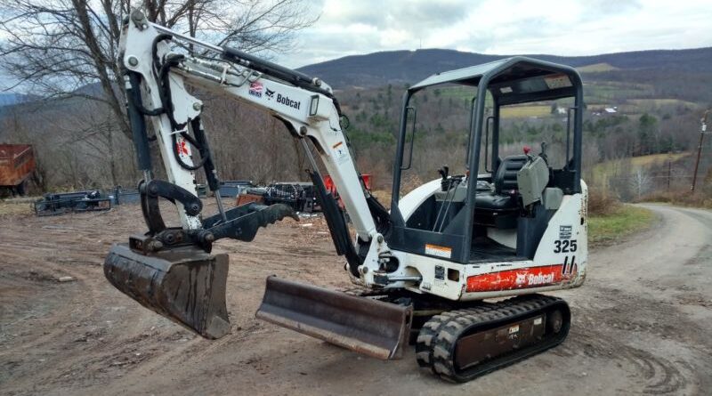 Bobcat 325 – Boîte à fusibles