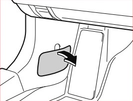 Emplacement de la boîte à fusibles Mazda 3 (2019-2020) derrière le couvercle.